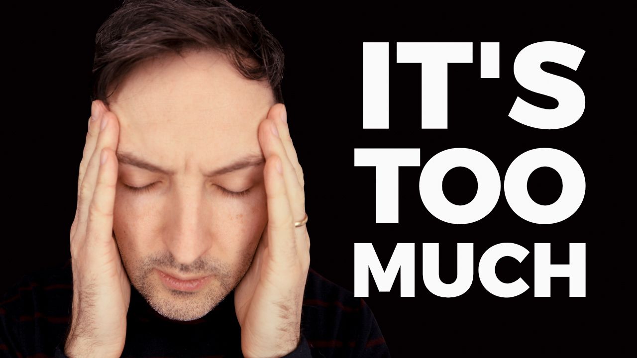 Richard Pryn holding his head in his hands beside the words It's Too Much