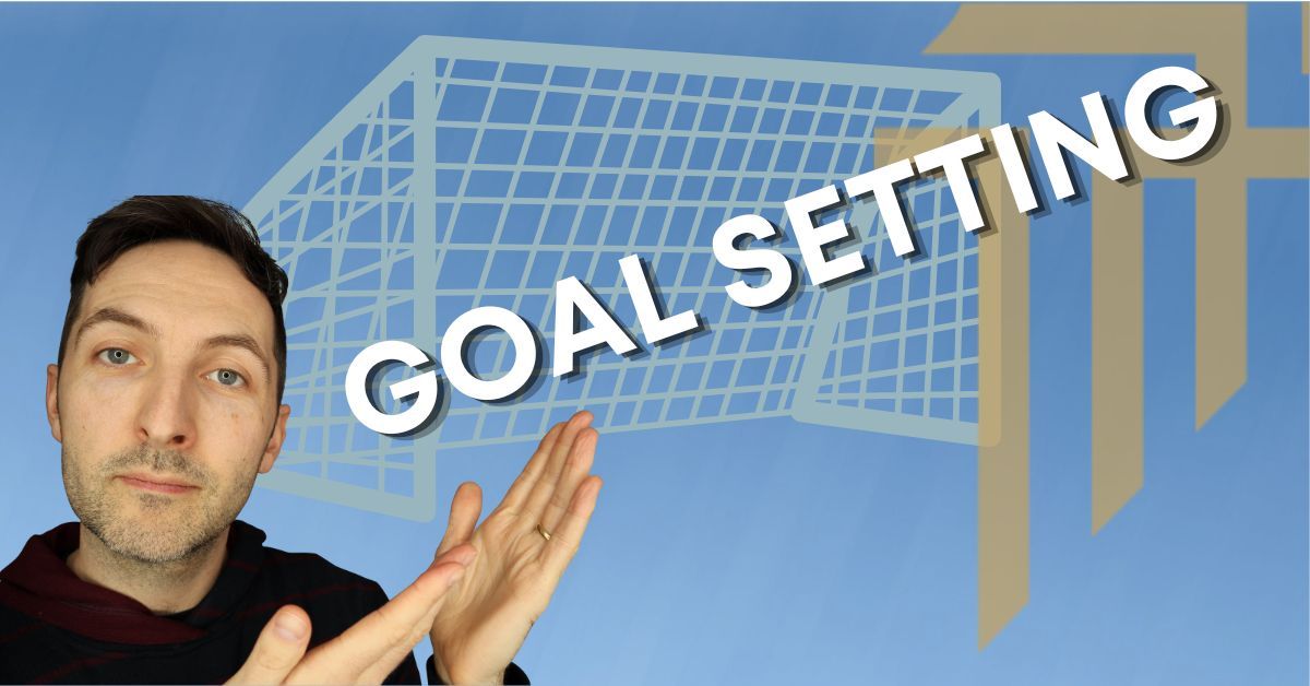 Richard Pryn gesturing towards a football goal net with the words Goal Setting