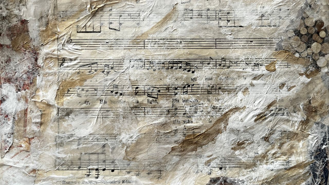 Mixed-media collage of old sheet music layered with white paint and gold brushstrokes