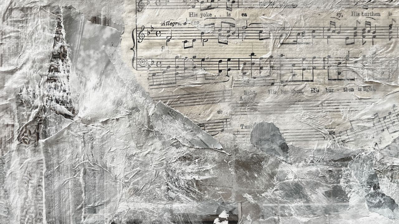 Mixed-media collage of old sheet music and crumpled paper in white and grey