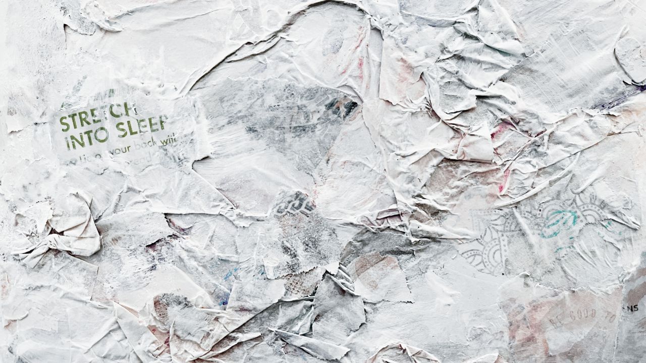White textured paper collage with a torn magazine scrap reading Stretch into sleep, by Deborah Pryn