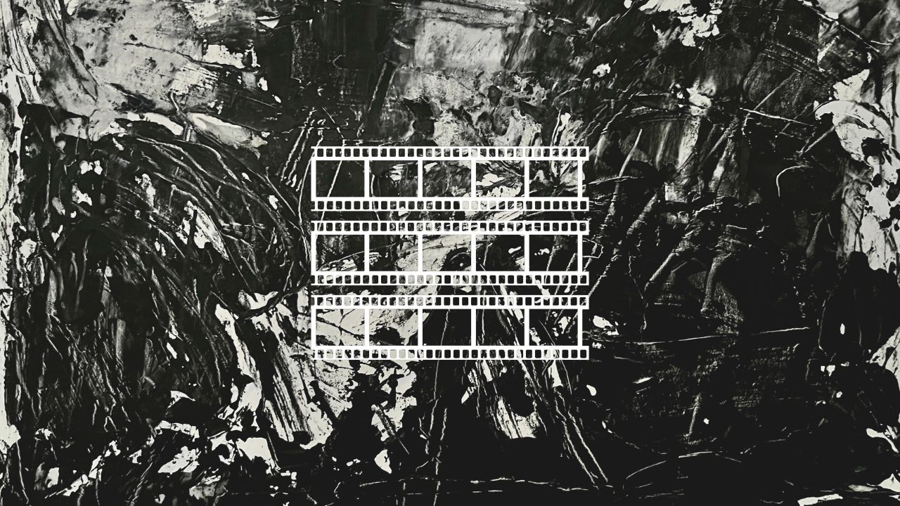 Black and white abstract painted texture with three strips of white film frames in the centre