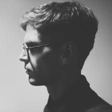 Mood board image: black and white side profile of a man in glasses
