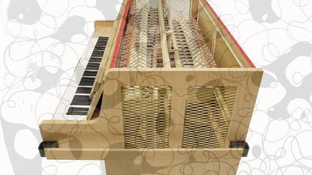 A celesta with its top open, showing the keyboard and the hammers inside