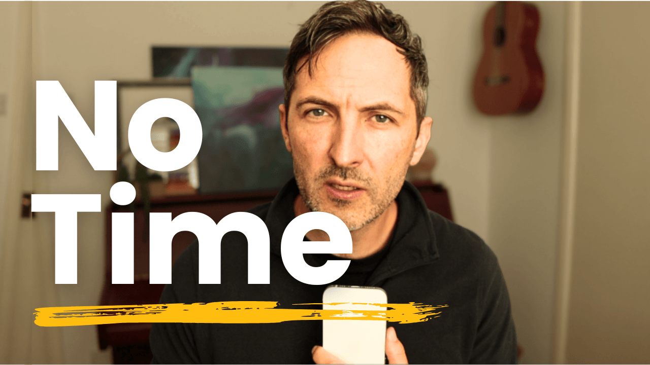 Richard Pryn holding a phone beside the words No Time
